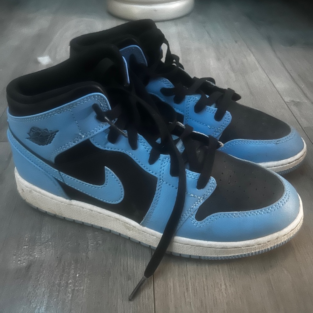light blue and black air Jordans 7y will be cleaned before shipping